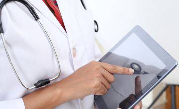 Closeup view of doctor using tablet computer / Representational image (PHOTO: Getty Images)  